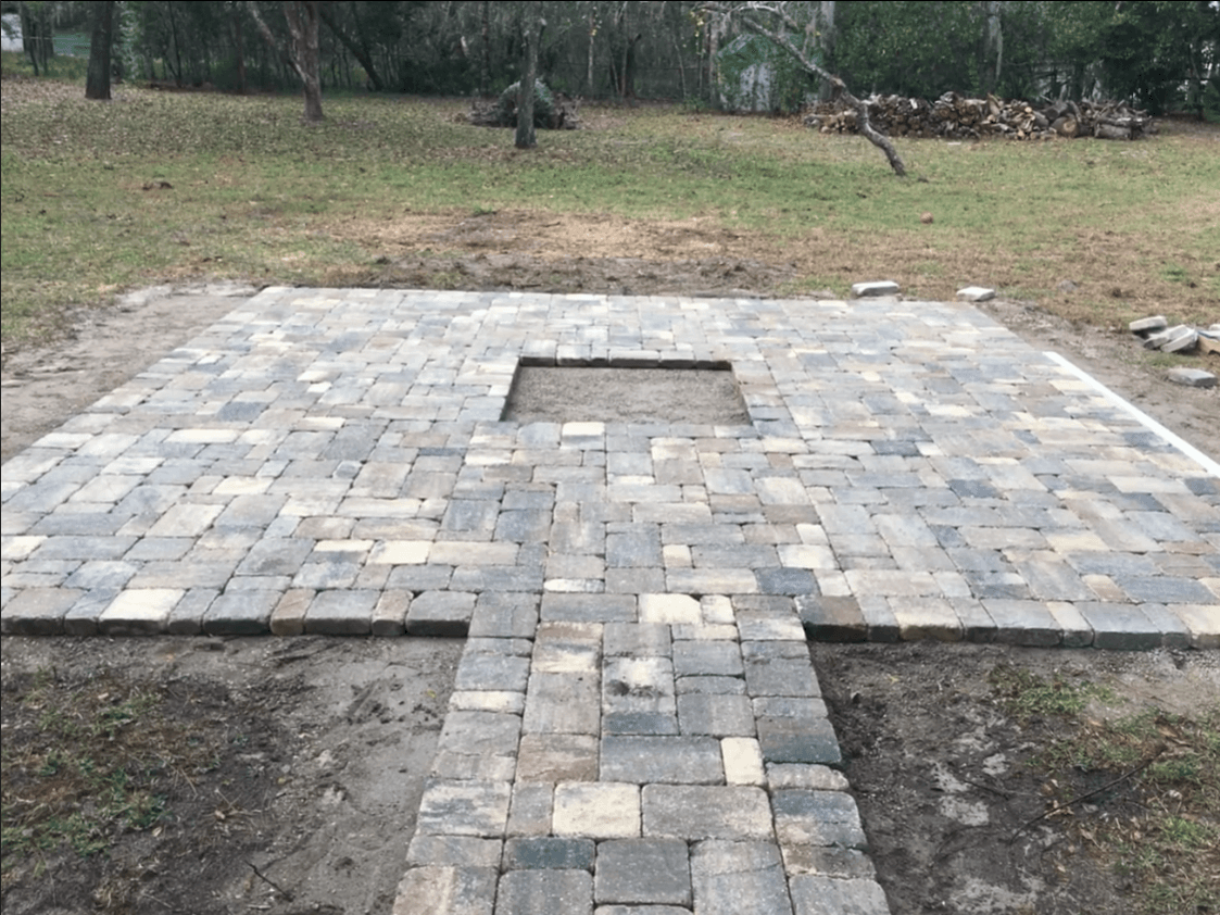 Custom paver fire pit installation in North Florida
