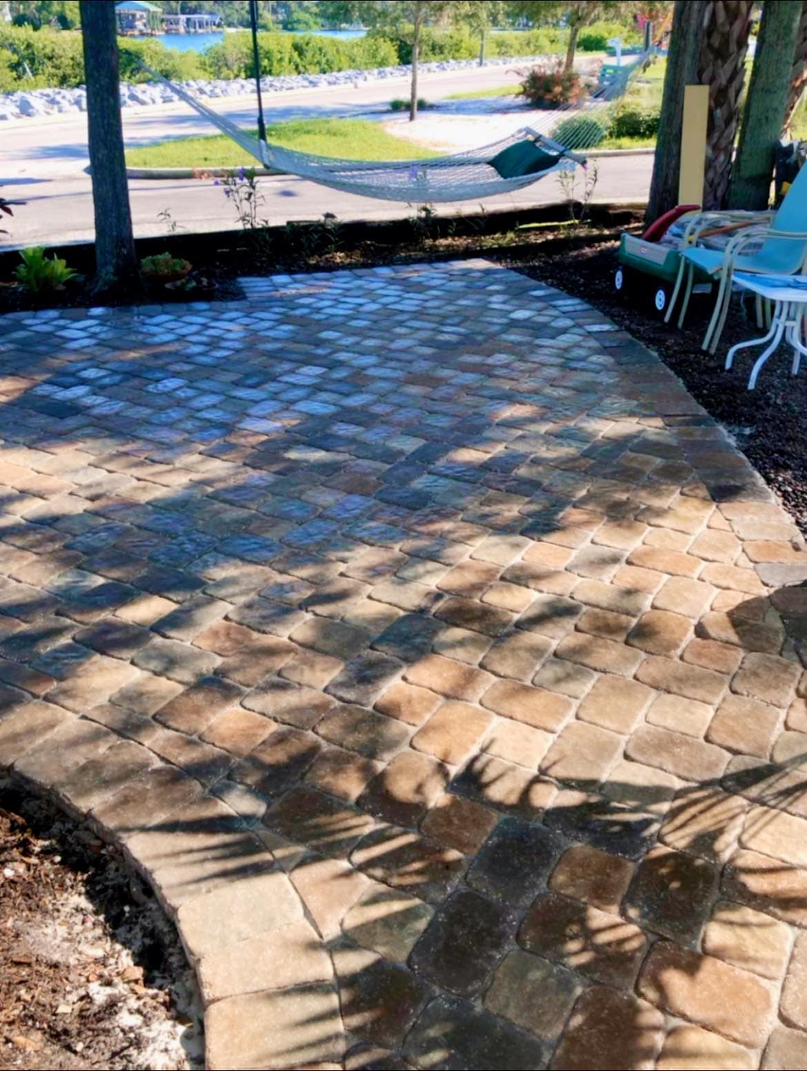 Custom paver patio overlooking the bayou in North Florida
