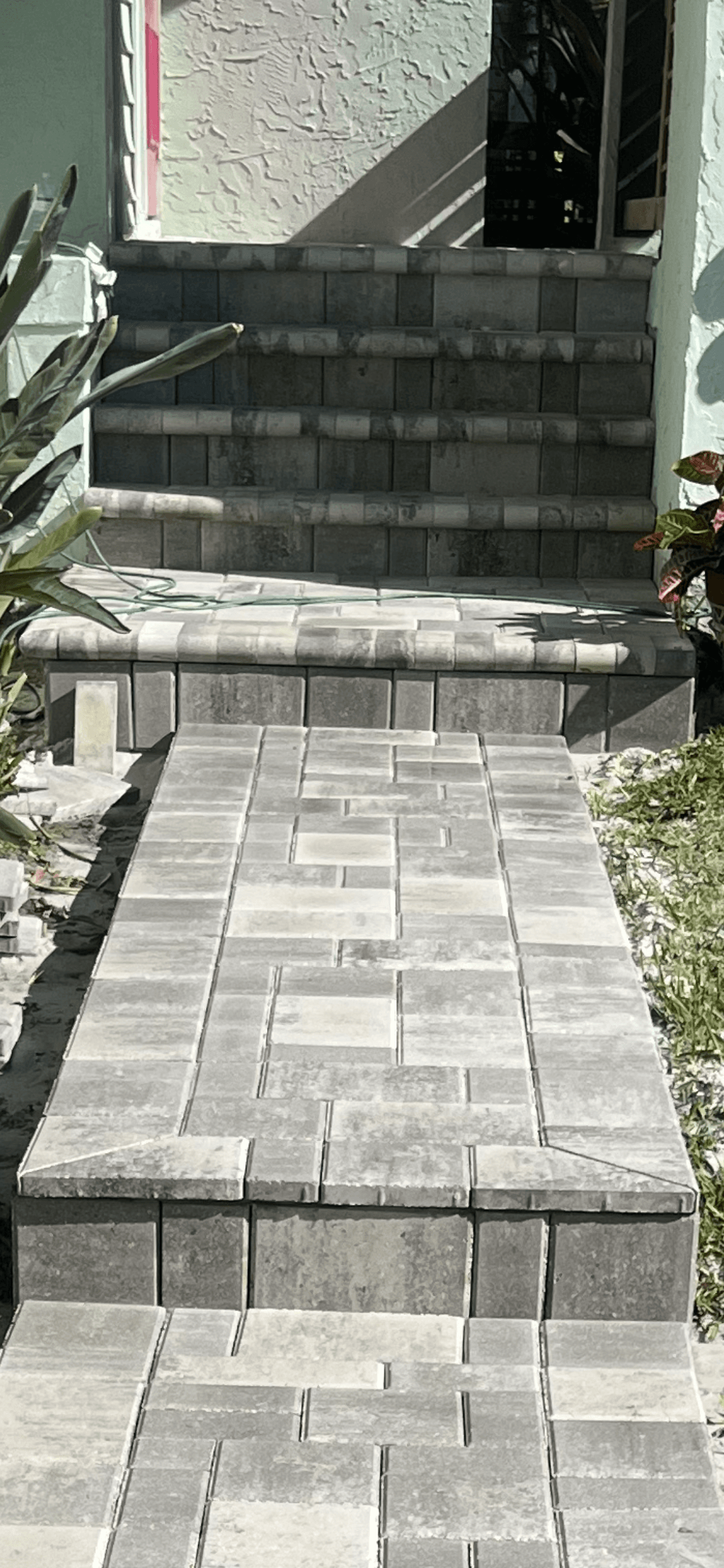 Gray paver walkway and steps